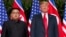 FILE - U.S. President Donald Trump, right, meets with North Korean leader Kim Jong Un on Sentosa Island, in Singapore, June. 12, 2018.