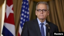 Jeffrey DeLaurentis, U.S. Charge d'Affaires in Cuba, delivers a speech after signing accords with Cuba to join forces to prevent, contain and cleanup oil spills in their respective Gulf of Mexico waters, in Havana, Cuba, Jan. 9, 2017. 