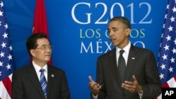 今年6月奥巴马总统和胡锦涛主席在20国峰会上举行双边会谈
