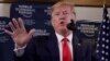 Presiden AS Donald Trump berbicara kepada media di Davos, Swiss, hari Rabu (22/1). 