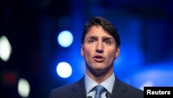 저스틴 트뤼도 캐나다 총리가 8일 퀘벡주 몬트리올에서 기자회견을 열고 기자들의 질문에 답하고 있다. 