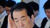 Japanese Prime Minister Clings to Office