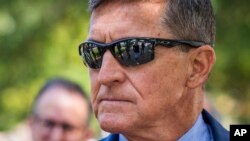 Michael Flynn, President Donald Trump's former national security adviser, leaves the federal court following a status conference with Judge Emmet Sullivan, in Washington, Sept. 10, 2019.