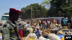FILE - Refugees from Central Africa Republic wait for a food distribution at an UNHCR refugee camp in the eastern Cameroonian city of Garoua-Boulai, not far from the border with Central Africa Republic.