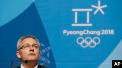 Matthieu Reeb, secretary general of the Court of Arbitration for Sport, speaks during a press conference about Russian athletes who are challenging the decisions taken by the Disciplinary Commission of the International Olympic Committee (IOC DC) Feb. 1, 2018. (AP Photo/Felipe Dana)