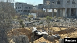 Sebuah pemakaman massal disiapkan bagi warga Palestina yang tewas dalam serangan Israel ke wilayah Beit Lahiya, di utara Jalur Gaza, pada 5 November 2024. (Foto: Reuters/Stringer)