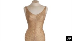 Marilyn Monroe had to be sewn into the form-fitting gown. (Julien's Auctions via AP) 