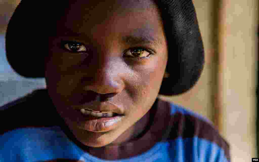 Nine-year-old Rabe Mohammed was injured and lost his right leg when an Antonov bombed his home last year. (Adam Bailes/VOA News)