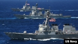 USS McCampbell, USS Lassen and USS Shoup, three Arleigh Burke-class destroyers, steam in formation during a photo exercise. (U.S. Navy photo by Chief Photographer Mate Todd P. Cichonowicz)