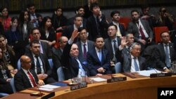 Dewan Keamanan PBB memberikan suara pada sebuah resolusi yang mengizinkan keanggotaan Palestina di PBB. Pengambilan suara tersebut berlangsung di markas besar PBB di New York dalam pertemuan Dewan Keamanan PBB yang membahas situasi di Timur Tengah, termasuk Palestina.(Foto: AFP)