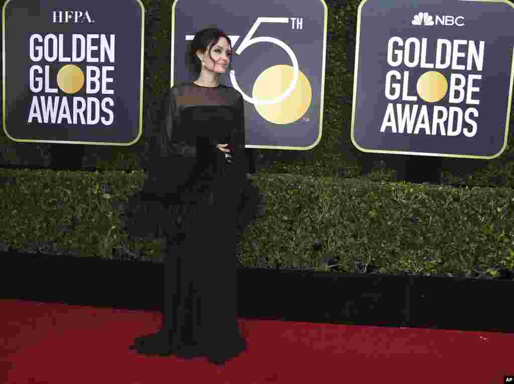 Angelina Jolie arrives at the 75th annual Golden Globe Awards at the Beverly Hilton Hotel on Sunday, Jan. 7, 2018, in Beverly Hills, Calif. (Photo by Jordan Strauss/Invision/AP)