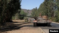 FILE - A burnt out tank stands near the town of Adwa, in Ethiopia's Tigray region, March 18, 2021.