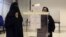 Saudi women vote during the country's municipal elections in Riyadh, Saudi Arabia, Dec. 12, 2015. Saudi women are heading to polling stations across the kingdom on Saturday, both as voters and candidates for the first time.