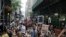 A large group of protesters march in New York City, reacting to recent police-related shootings of two black men in Minnesota and Louisiana, July 7, 2016.