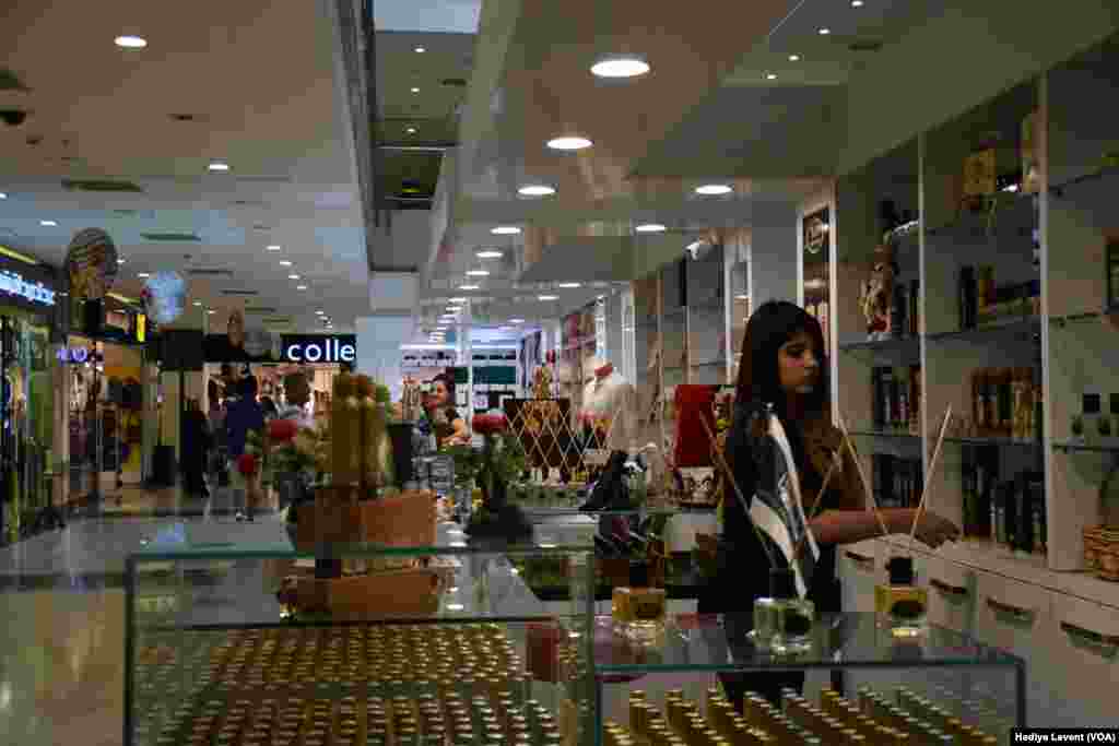 Modern shopping malls in Irbil are as important in daily life as the traditional and old shopping centers. International brands can be found for sale in the malls, and they have become meeting places for people trying to escape the hot weather in Iraq.