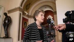 FILE - Rep. Jan Schakowsky, D-Ill., takes questions during a TV news interview before votes in the House, on Capitol Hill in Washington, May 10, 2019.