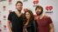 FILE - Lady Antebellum's Charles Kelley, Hillary Scott and Dave Haywood, from left, arrive at the iHeartRadio Country Festival in Austin, Texas, March 29, 2014.