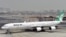FILE - A picture taken on September 14, 2017, shows an Airbus A340 of Mahan Air at the tarmac at Dubai's International Airport.