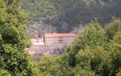FILE - The Monastery of Saint Anthony of Qozhaya is nestled in the heart of the Qadisha valley, in Zgharta district, Lebanon, April 26, 2007.