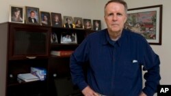 John Ryan of Aldie, Virginia, diagnosed with incurable lung cancer two years ago, was randomly assigned to receive the immunotherapy drug Opdivo in a study two years ago. Three months later, his tumor had been reduced by 65 percent. (AP Photo/Manuel Balce Ceneta)