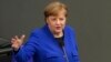 Kanselir Jerman Angela Merkel membahas pembukaan perbatasan di depan parlemen Jerman hari Rabu (13/5).
