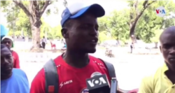 This anti-government protester standing near the National Palace in Port-au-Prince says the country's lawmakers don't take the people seriously. (Photo: Matiado Vilme)