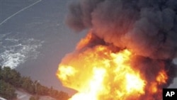 Oil refinery facility is on fire in Ichihara, Chiba Prefecture (near Tokyo) after strong earthquakes hit Japan, March 11, 2011