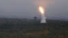 An air defense missile system flies during a military exercises on training ground "Telemba," about 80 kilometers (50 miles ) north of the city of Chita during the military exercises Vostok 2018 in Eastern Siberia, Russia, Sept. 12, 2018. 