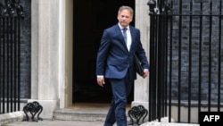 گرانت شاپس، وزیر دفاع بریتانیا - آرشیو