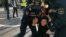 Protesters who gathered in the Fountain Square to demand Saleh Rustamov's release were detained by the Azerbaijani police in Baku, Azerbaijan, Dec 1, 2021. (Ulviyya Guliyeva/VOA)