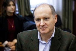 Philippe Delpal, partner at Baring Vostok equity firm sits in a court room in Moscow, Russia, Feb. 10, 2020.