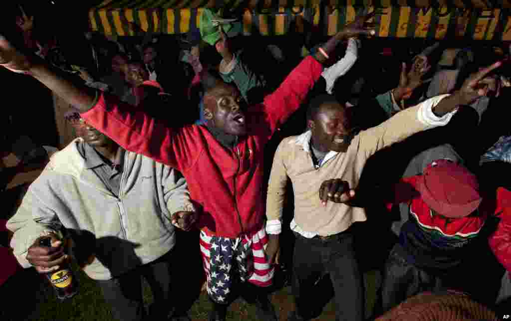 Villagers dance at an all-night party to watch the U.S. presidential election in the village of Kogelo, home to Sarah Obama the step-grandmother of President Barack Obama, in western Kenya, November 6, 2012.