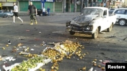 Kerusakan di lokasi ledakan bom bunuh diri di Sweida, Suriah, 25 Juli 2018.