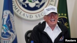 President Donald Trump speaks during a roundtable discussion with officials after arriving for a visit to the U.S.-Mexico border at McAllen-Miller International Airport in McAllen, Texas, Jan. 10, 2019.