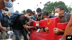 Scuffles Erupt in Hong Kong as Hundreds Break Down Protest Barriers