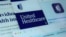 FILE - Pages from the United Healthcare website are displayed on a computer screen on Feb. 29, 2024. Change Healthcare, a massive U.S. health care technology company owned by UnitedHealth Group, announced a ransomware group claimed responsibility for a cyberattack on its systems.