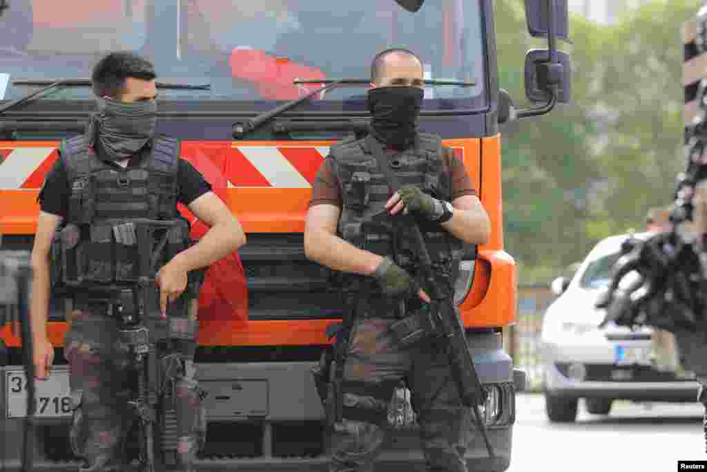 Members of the police special forces stand guard in front of the Air Force Academy in Istanbul, Turkey, July 18, 2016. 
