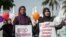 FILE - Indonesian mothers protest child sexual abuse in Banda Aceh in Aceh province, on western Sumatra island, April 24, 2014, following incidents of child sexual abuse in Banda Aceh and in Jakarta.
