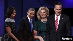 Shugaban Amurka Brack Obama da uwargidansa Michelle, da kuma abokin takararsa Mitt da Ann Romney.
