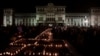 Outside National Palace in Guatemala City, people light candles during a vigil for victims of a fire at the Virgen de Asuncion home in San Jose Pinula, March 9, 2017.