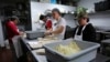 Kitchen staff prepare egg rolls at Seaport Buffet, in Sheepshead Bay, Brooklyn.