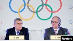 Pejabat Komite Olimpiade Internasional (IOC) mengumumkan larangan terhadap atlet Rusia berkompetisi dalam Olimpiade Musim Dingin, di Lausanne, Swiss (5/12).