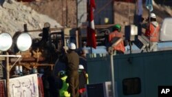 Des travailleurs impliqués dans les opérations de secours