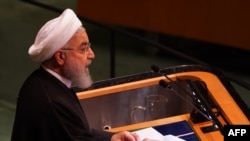 Le président iranien Hassan Rouhani prononce son discours lors du débat général de la 73ème session de l'Assemblée générale des Nations Unies à New York le 25 septembre 2018