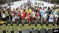Survivors and relatives of the victims of the 2002 Bali bombings attend a ceremony marking the 10th anniversary of the Bali attacks at the Garuda Wisnu Kencana cultural park in Jimbaran located in Indonesia's resort island of Bali, October 12, 2012.