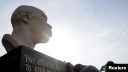 Terrence Floyd, brother of the late George Floyd who was killed by a police officer, reacts during the unveiling event of Floyd's statue, as part of Juneteenth celebrations, in Brooklyn, New York, June 19, 2021.