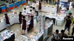 Luxury items are displayed for sale at a Saigon Coop supermarket in Hanoi.