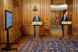 Medical Director of NHS England, Professor Stephen Powis, speaks as Britain's Culture Secretary Oliver Dowden chairs the daily coronavirus disease news conference at 10 Downing Street in London, Britain, May 20, 2020.