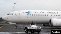 Pesawat Garuda Indonesia di landasan Garuda Maintenance Facility AeroAsia di Bandara Soekarno-Hatta, 13 Maret 2019. (Foto: Willy Kurniawan/Reuters)