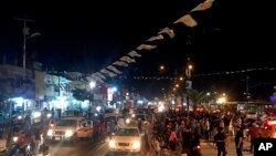 អ្នក​គាំទ្រ​លោក Muqtada al-Sadr ចេញ​មក​សាទរ​នូវ​ជ័យ​ជម្នះ​របស់​លោក​នៅ​ក្នុង​ក្រុង Sadr ប្រទេស​អ៊ីរ៉ាក់ កាលពី​ថ្ងៃទី១៤ ខែឧសភា ឆ្នាំ២០១៨។